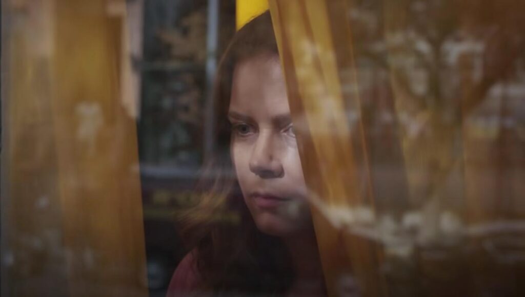 La mujer en la ventana